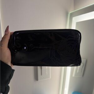 Glossy Black Patent Cosmetic Pouch with Subtle Rose Detail